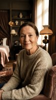 Senior Caucasian woman in cozy beige sweater sitting comfortably in elegant vintage living room with warm natural lighting and classic home decor.