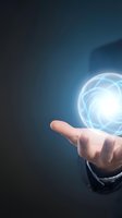 Businessman hand holding glowing energy sphere with network connections on dark blue background for technology and innovation concepts.