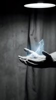 Business growth concept with glowing chart graph floating above cupped hands under spotlight beam for financial success presentations.