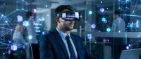Professional businessman wearing VR headset exploring virtual reality technology in modern office with digital network connections and futuristic interface.