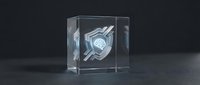 Transparent acrylic cube displaying metallic mechanical turbine component with glowing center, isolated on dark background for product showcase and design applications.