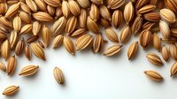 Fresh brown rice grains scattered on white background, macro view of natural cereal texture showing detailed striped pattern of each grain. Isolated food photography.