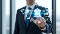 Professional businessman in dark suit presenting digital banking interface with holographic financial icons and data visualization for fintech solutions.