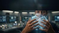 Young businessman holding glowing digital network sphere with connected nodes in modern office environment showcasing technology innovation and connectivity.