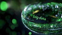 Futuristic green glowing crystal ball with big data text reflection against dark background with bokeh lights, technology concept visualization for data analytics.
