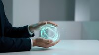 Businessman holding glowing digital sphere with network connections, representing technology innovation, data science, and global business solutions for corporate and tech industry applications.