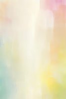 Soft pastel watercolor background with gentle blends of pink, yellow, mint green and cream tones creating an ethereal abstract composition. Suitable for design projects.