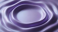 Smooth purple and white concentric circles create an abstract swirl pattern with soft, flowing waves. Suitable for backgrounds, web design, and digital projects.