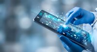 Medical professional using digital tablet with holographic data visualization in modern healthcare technology environment for patient care and diagnosis.