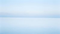 Serene minimalist seascape with calm water and soft blue gradient sky, suitable for wellness, meditation, and relaxation design projects.