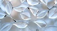 White abstract leaf shapes creating dimensional pattern on light background. Modern minimalist design element for contemporary interior decor and surface patterns.