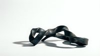 Dark green twisted ribbon flowing in elegant curves against white background creating dramatic shadows for luxury branding and sophisticated design projects.