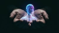 Glowing translucent human figure emerging from cupped hands against dark background representing spiritual energy, consciousness and divine protection concept.