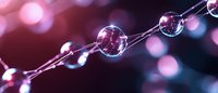 Shiny glass beads on string with pink and purple bokeh background, creating elegant decorative element for festive or celebration designs.