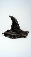 Vintage black witch hat with ornate embroidered patterns isolated on white background for Halloween costume and magical themed designs.