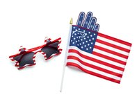 Foam hand with American flag and patriotic novelty items isolated on white background, ready for design use on merchandise, promotional materials, and holiday celebrations.
