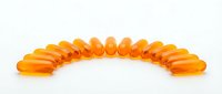 Orange gel capsules arranged in curved line on white background for pharmaceutical and health supplement marketing materials.
