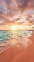Tropical beach at sunset with golden sky, turquoise waves, and sandy shore. Solitary palm tree on horizon. Ideal for travel, vacation, and relaxation themes.