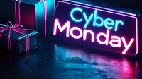 Glowing neon Cyber Monday sign with wrapped gift box in pink and blue colors reflecting on dark wet surface, creating modern shopping atmosphere.