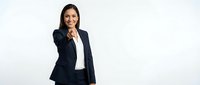 Confident businesswoman in dark suit smiling with hand on chin in thoughtful pose against white background for corporate presentations and marketing.