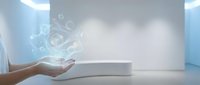 Digital transformation concept with glowing technology icons floating above open palm in modern minimalist interior space for business presentations.