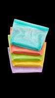 Colorful reusable silicone storage bags stacked together, isolated on transparent background. Great for stickers, clipart, print on demand, and t-shirt design use.