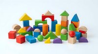 Colorful wooden building blocks set with geometric shapes including cubes, cylinders, triangles and arches for children educational play and development.