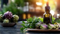 Fresh artichokes and aromatic herbs with essential oil dropper bottle on wooden table in garden setting, natural wellness and holistic medicine concept.