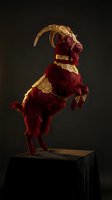 Traditional Indonesian Barong dance performer in ornate red costume with golden details and curved headdress against dark background for cultural arts projects.