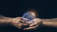 Two hands holding glowing globe with digital network connections, representing global business collaboration, environmental care, and worldwide communication technology.
