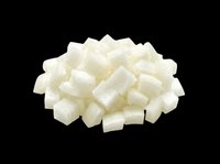 Diced white onion pile isolated on transparent background, ready for food clipart, recipe cards, t-shirt design, print on demand, and sublimation projects.