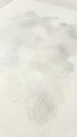 White granulated sugar spilled and scattered on clean surface creating textured culinary ingredient background for cooking and baking projects.