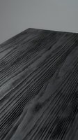Dark wooden surface with natural grain texture in monochrome perspective view for interior design and furniture applications.