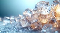 Glowing ice crystals with golden light in macro view against blue background, frozen water structure with warm illumination creates magical winter atmosphere.