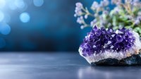 Raw amethyst crystal cluster with purple quartz formations on natural stone base against blurred blue bokeh background, showcasing mineral's natural beauty.