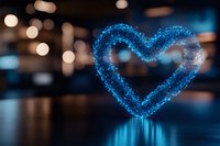 Glowing blue heart shape formed by luminous particles floating in dark space with bokeh lights and reflective surface, romantic atmosphere for Valentine designs.