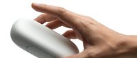 Male hand with medium skin tone holding white cylindrical device on white background, suitable for product mockups, technology presentations, and consumer electronics marketing materials.