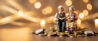 Senior Asian couple sitting on pile of golden coins with warm bokeh lights background representing retirement savings and financial security planning.
