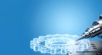 Dental drill with transparent gear mechanism on blue background, suitable for dental care, technology, and medical education materials.