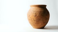 Ancient clay pottery vessel with weathered texture and earthy brown patina isolated on white background for archaeological and historical design projects.
