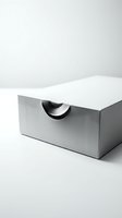Minimalist white cardboard box with curved handle cutout on clean background for product packaging and branding mockup presentations.