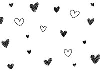 Scattered hand drawn black and white hearts on white background create romantic seamless pattern for valentines cards, wedding invitations and love themed designs.