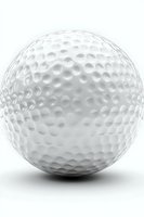 Close-up of white golf ball showing detailed dimpled surface texture and spherical shape on clean background, isolated object for sports design projects.