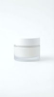 White cosmetic jar with cream on clean background for skincare and beauty product packaging design.