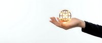 Businessperson holding glowing globe icon symbolizing global connectivity, international business, and worldwide digital network expansion opportunities.