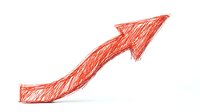 Hand-drawn red arrow pointing upward on white background. Sketch style growth symbol for business presentations and financial reports.