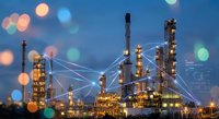 Industrial oil refinery complex with digital network connections at twilight showcasing smart manufacturing technology and automated systems for energy production.