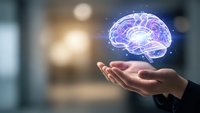Digital brain hologram floating above open palm representing artificial intelligence, neuroscience research, and cognitive technology innovation concepts.