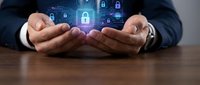 Businessman hands protecting digital security network with glowing padlock icons and circuit board patterns for cybersecurity and data protection concepts.