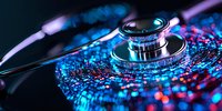 Compact disc surface with water drops illuminated by neon blue and pink lights creating futuristic reflection pattern, macro photography with shallow depth of field.